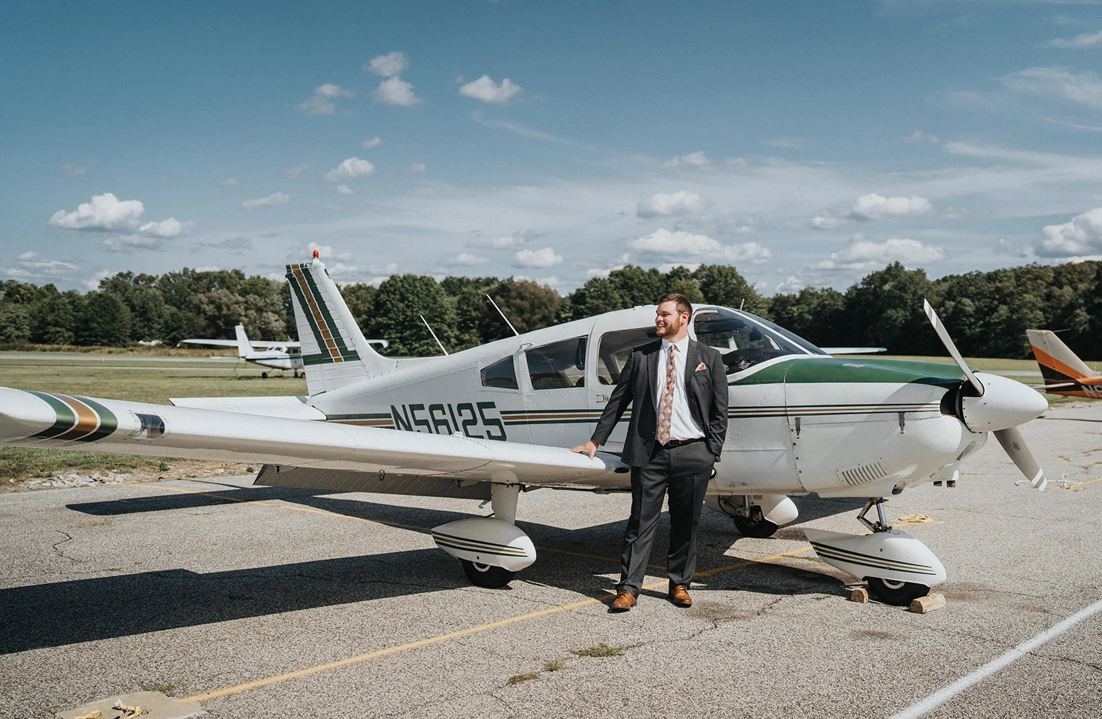 Jonathan Wieting standing beside an aircraft